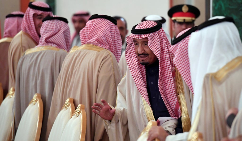 Saudi Arabia's King Salman takes his seat during a meeting with Russian President Vladimir Putin at the Kremlin in Moscow, Russia, October 5, 2017. REUTERS/Yuri Kadobnov/Pool