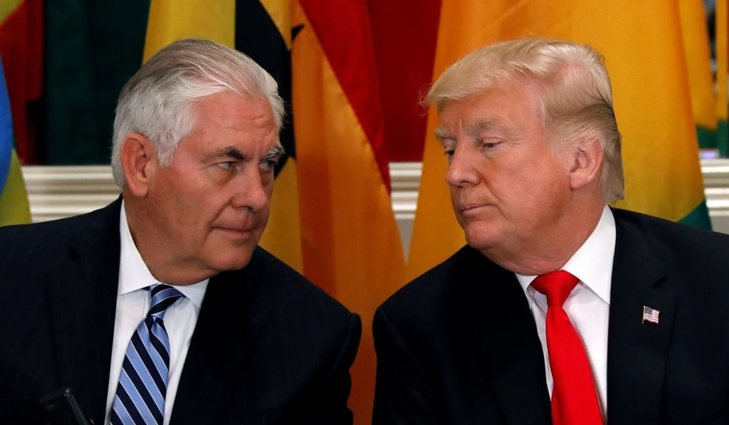 President Donald Trump and Secretary of State Rex Tillerson confer during a working lunch. News reports allege that Tillerson said the president was a ‘moron’. Photo: Reuters
