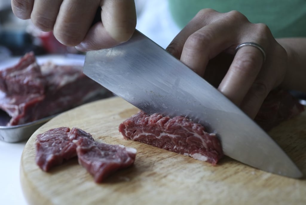 Slice meat into strips about 3cm long. Slice meat into strips about 3cm long.