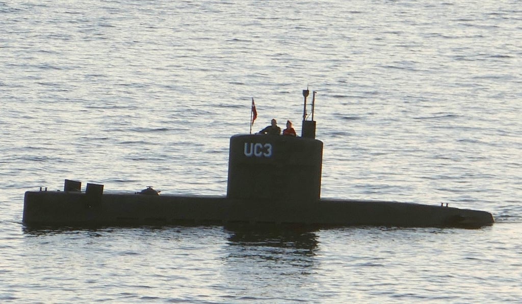 Photo said to show Kim Wall standing next to a man accused of killing her on the private submarine UC3 Nautilus on August 10, 2017 in Copenhagen Harbour. Photo: AFP