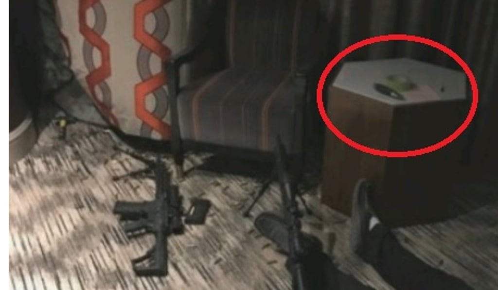 A photo taken inside the hotel room of Las Vegas gunman Stephen Paddock shows a note (circled) on a small table. Photo: Twitter/Mike Tokes A photo taken inside the hotel room of Las Vegas gunman Stephen Paddock shows a note (circled) on a small table. Photo: Twitter/Mike Tokes