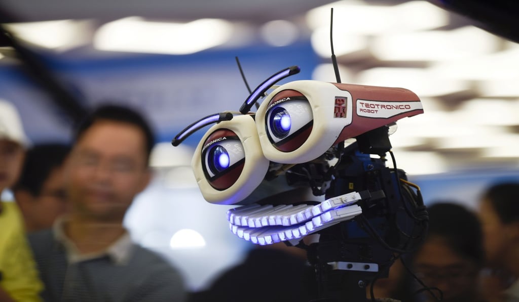 A robot called “Teotronico” plays the piano and sings at the 2017 World Robot Conference in Beijing. Photo: AFP