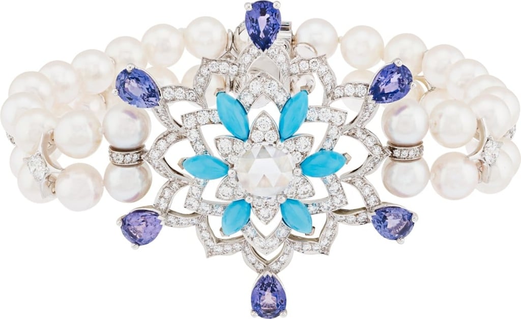 This gorgeously designed Valse des Flocons bracelet in white gold features an opulent combination of pearls, diamonds and gemstones. This gorgeously designed Valse des Flocons bracelet in white gold features an opulent combination of pearls, diamonds and gemstones.