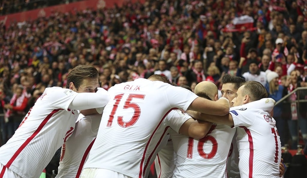 Poland players celebrates during their win over Montenegro. Photo: AP