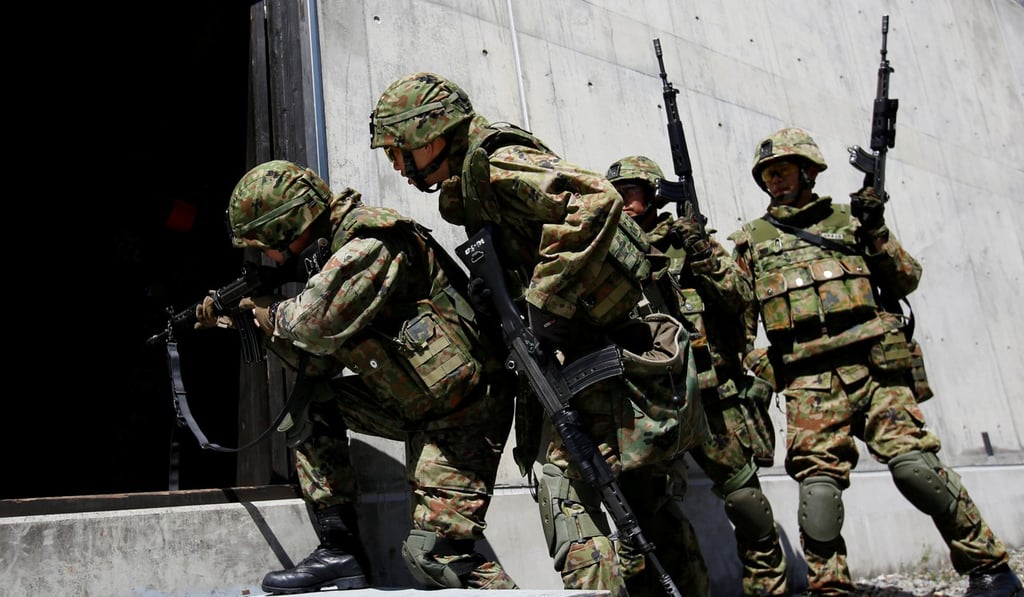 Japan Ground Self-Defence Force members take part in an urban warfare drill in September, 2017. Photo: Reuters