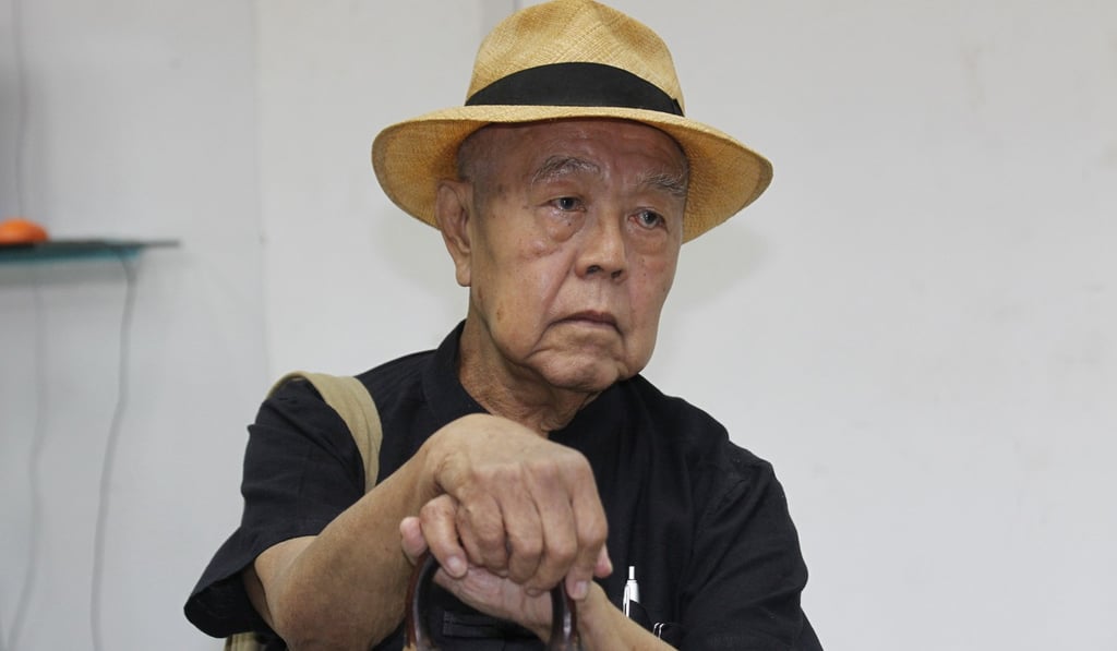 Thai social critic Sulak Sivaraksa at a police station before going to a military court. Photo: AP Thai social critic Sulak Sivaraksa at a police station before going to a military court. Photo: AP