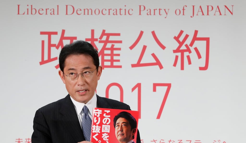 Japan's ruling Liberal Democratic Party (LDP) policy chief Fumio Kishida unveils the party's election campaign platform. Photo: Reuters