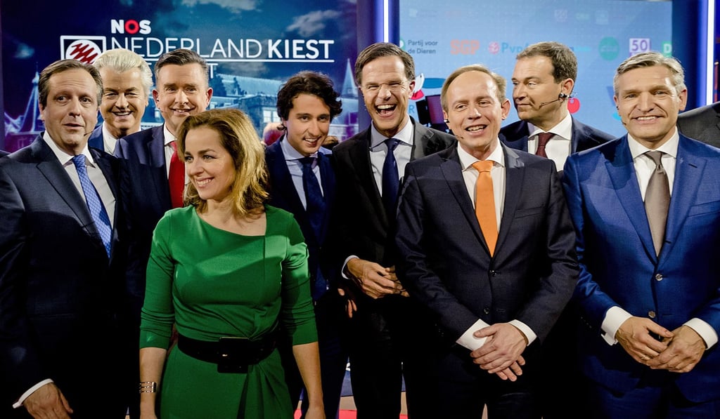 A March 14, 2017, photo of Democrats 66 party leader Alexander Pechtold, right-wing populist leader Geert Wilders, Socialist Party leader Emile Roemer, Party for the Animals’ Marianne Thieme, Green Left party leader Jesse Klaver, Dutch Prime Minister Mark Rutte, Gert-Jan Segers of the Christian Union, Labour Party leader Lodewijk Asscher, and Christan Democrats party leader Sybrand Buma pose for a picture after the closing debate at parliament in The Hague. Photo: AP