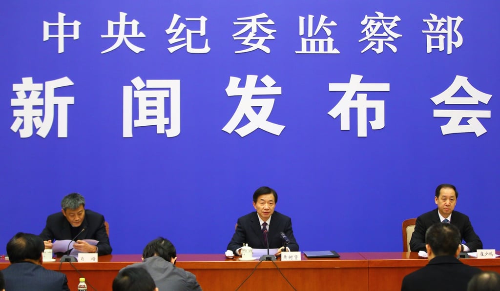 Huang Shuxian (centre), deputy secretary of the Central Commission for Discipline Inspection, speaks about the anti-corruption campaign in Beijing in 2015. Photo: Xinhua