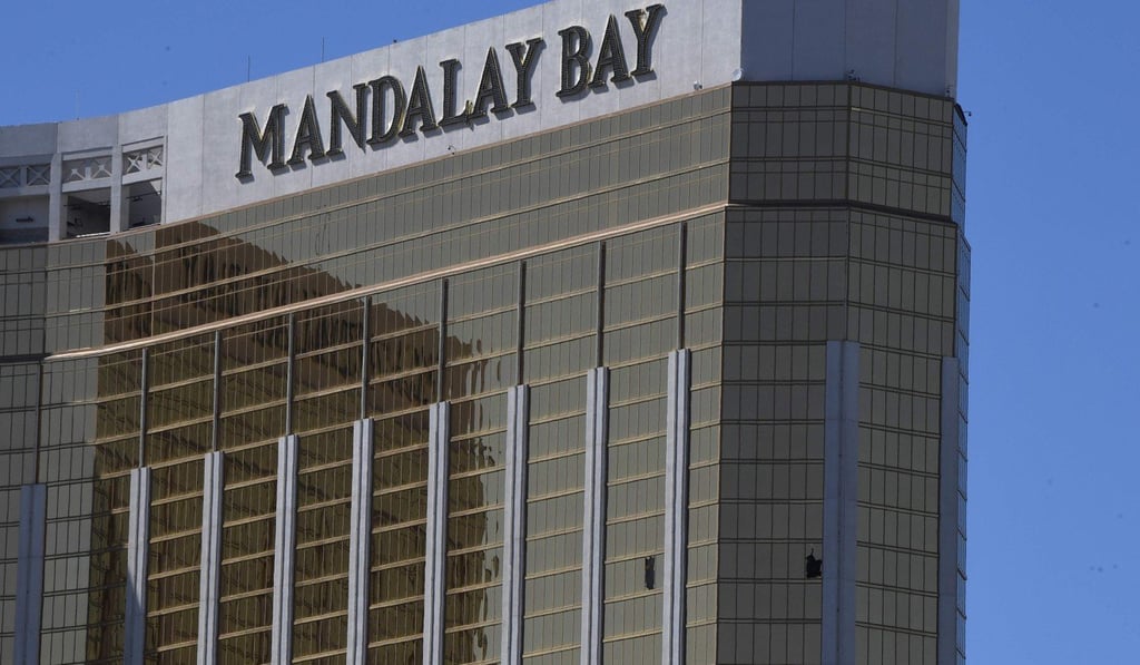 The damaged windows on the 32nd floor room that was used by the shooter in the Mandalay Bay Resrt and Casono. Photo: AFP