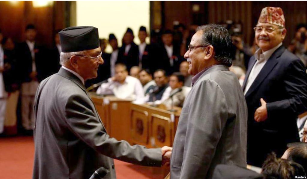 KP Sharma Oli, chairman of the Communist Party of Nepal (Unified Marxist- Leninist) (left) shakes hands with Pushpa Kamal Dahal “Prachanda” chairman of the Communist Party of Nepal (Maoist Centre). Photo: Reuters KP Sharma Oli, chairman of the Communist Party of Nepal (Unified Marxist- Leninist) (left) shakes hands with Pushpa Kamal Dahal “Prachanda” chairman of the Communist Party of Nepal (Maoist Centre). Photo: Reuters