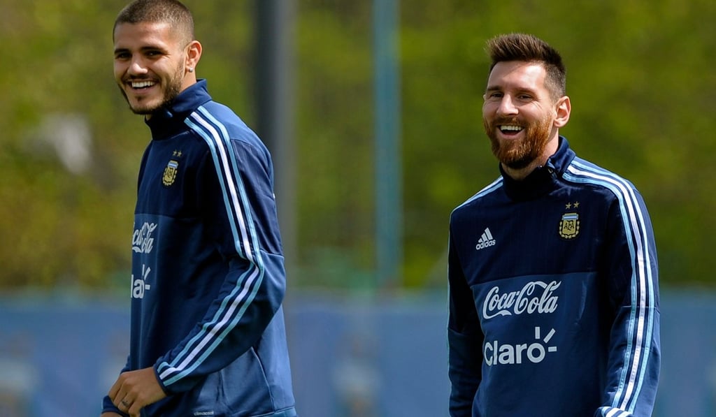 Argentina's forwards Lionel Messi (R) and Mauro Icardi laugh during a training session in Ezeiza, Buenos Aires. Messi is the top rival of Cristiano Ronaldo for footballer of the year. Photo: AFP Argentina's forwards Lionel Messi (R) and Mauro Icardi laugh during a training session in Ezeiza, Buenos Aires. Messi is the top rival of Cristiano Ronaldo for footballer of the year. Photo: AFP