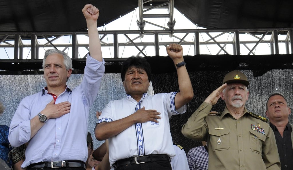 Bolivian Vice-President Alvaro Garcia Linera (left), President Evo Morales, and Cuba's vice-president Ramiro Valdes attend an event paying tribute to Ernesto 'Che' Guevara, marking the 50th anniversary of his death, in Vallegrande, Bolivia, on Monday. Photo: AP