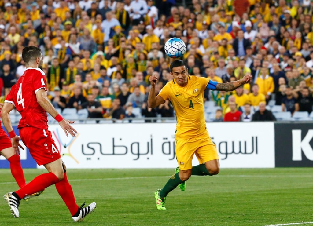 Australia’s Tim Cahill heads a goal. Photo: Reuters