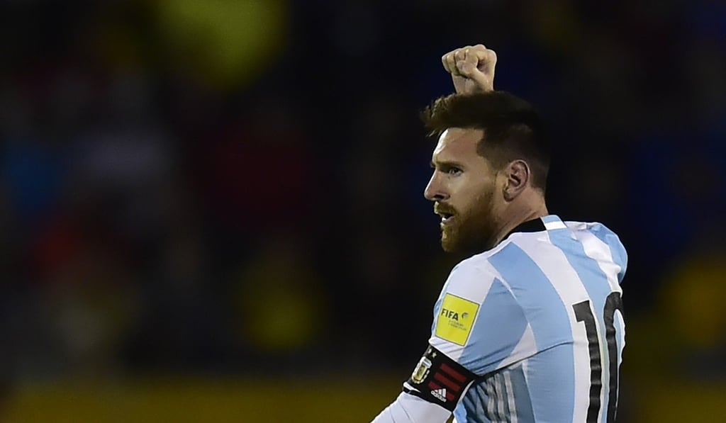 Argentina's Lionel Messi celebrates after scoring his third goal against Ecuador during the 2018 World Cup qualifying match in Quito, October 10, 2017. Photo: AFP