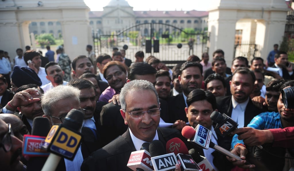 Indian lawyer Tanveer Ahmed Mir leaving Allahabad High Court after the acquital of his clients Rajesh and Nupur Talwar. Photo: AFP Indian lawyer Tanveer Ahmed Mir leaving Allahabad High Court after the acquital of his clients Rajesh and Nupur Talwar. Photo: AFP