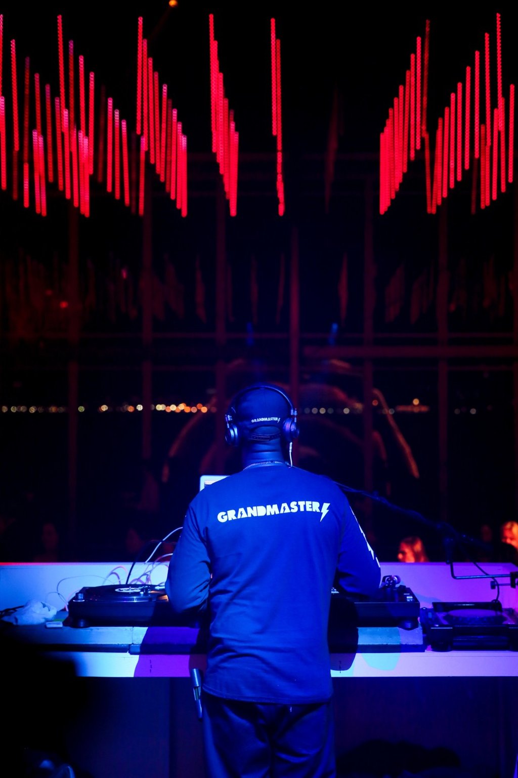 DJ Grandmaster Flash spins for the party.