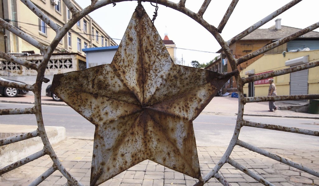 The gate to the old residential area for Dongbei Special Steel workers in Dalian, Liaoning province. Photo: SCMP Pictures