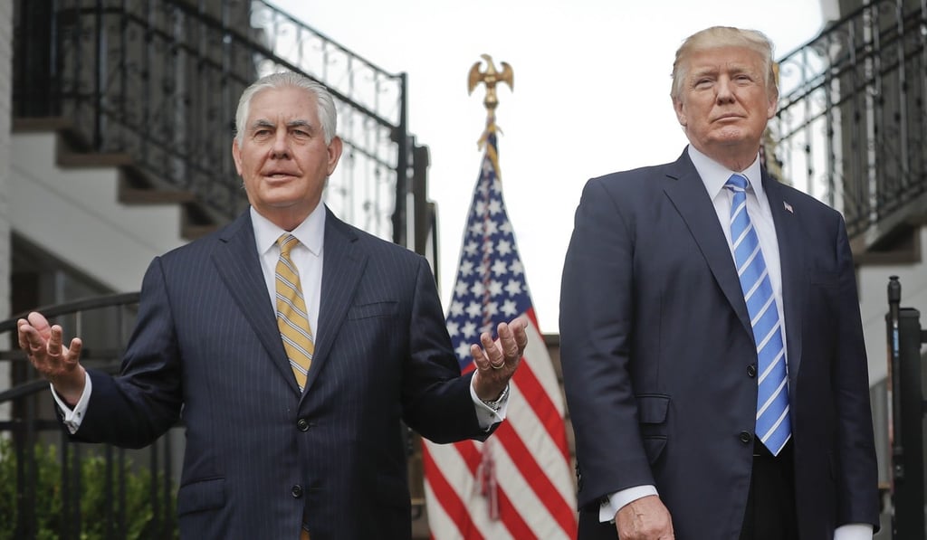 US Secretary of State Rex Tillerson with President Donald Trump at Trump National Golf Club in Bedminster, New Jersey, in August. Photo: AP