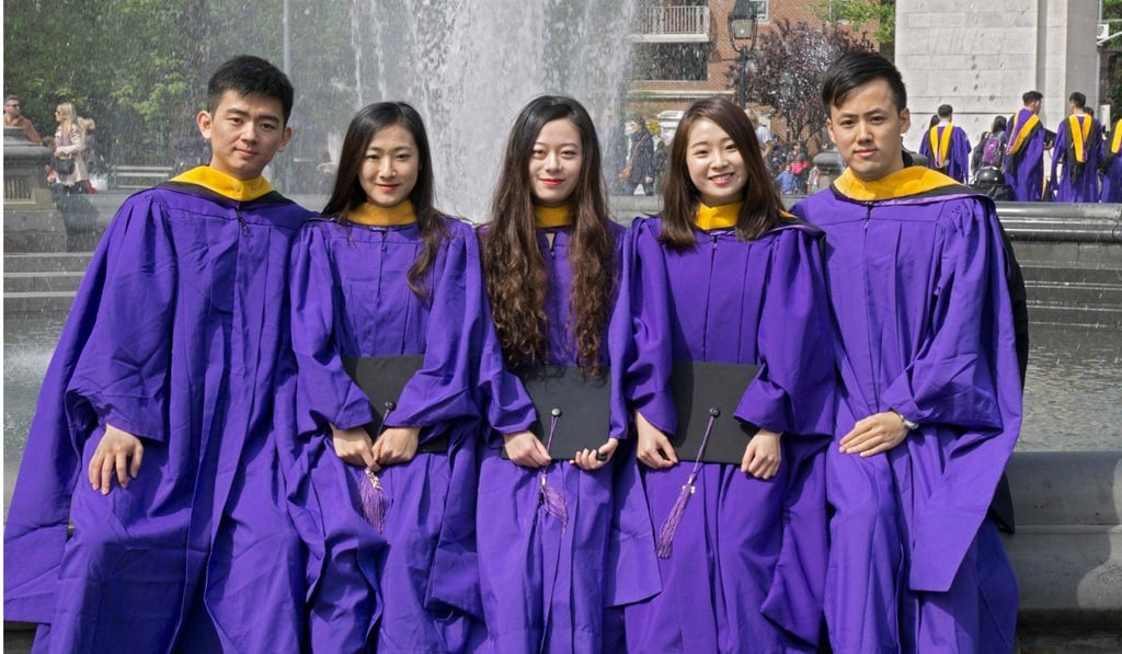 Chinese students celebrate graduation from New York University. The number of students from China studying in the US has been rising. Photo: Alamy