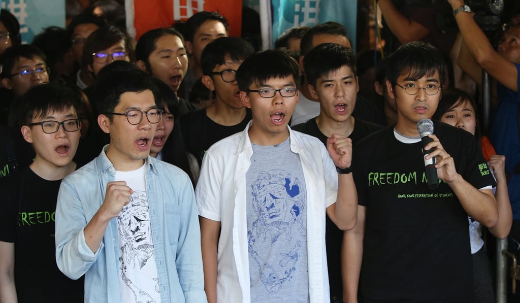 Former student leaders (from left) Nathan Law, Joshua Wong and Alex Chow were jailed in August. Photo: Sam Tsang