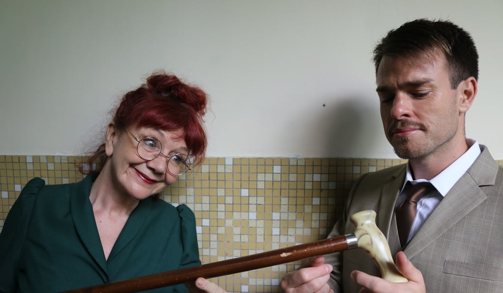 Gourlay Grant plays 14 different roles in Baskerville (pictured here as Mrs Hudson), while Adams just needs to concentrate on playing Dr Watson. Photo: Aaron Michelson