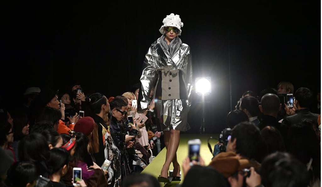 A model presents a creation by Japanese designers Ryota Murakami and Chiaki Murakami for the label 'RYOTAMURAKAMI' on Monday during the Amazon Fashion Week Tokyo. Photo: EPA