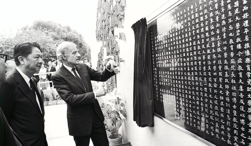 Professor Ma Lin (left) with Governor David Wilson at the unveiling of a plaque detailing the history of the newly opened Ho Tim Building at the Chinese University of Hong Kong. Photo: SCMP