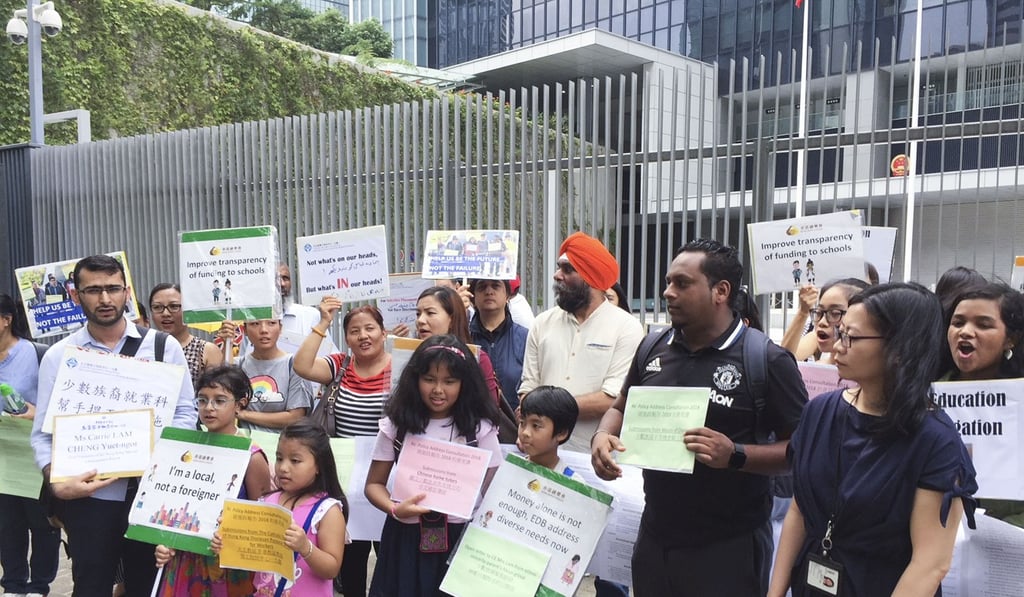 A group of ethnic minority residents gather outside the government headquarters on October 8 to call for equal opportunities. Photo: Tony Cheung