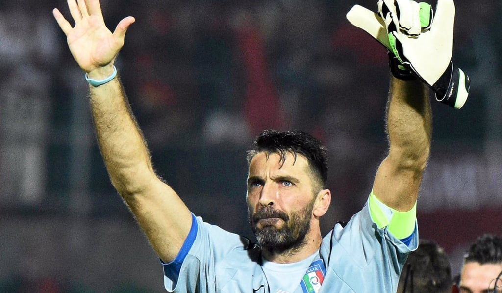 Veteran Italy goalkeeper Gianluigi Buffon celebrates his side’s qualifying win over Albania earlier this year. Photo: EPA
