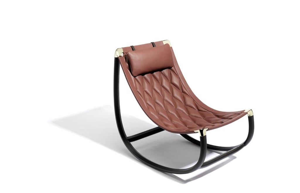 The crescent-shaped leather rocking chair by Marcel Wanders gives the home an elegant upgrade. The crescent-shaped leather rocking chair by Marcel Wanders gives the home an elegant upgrade.