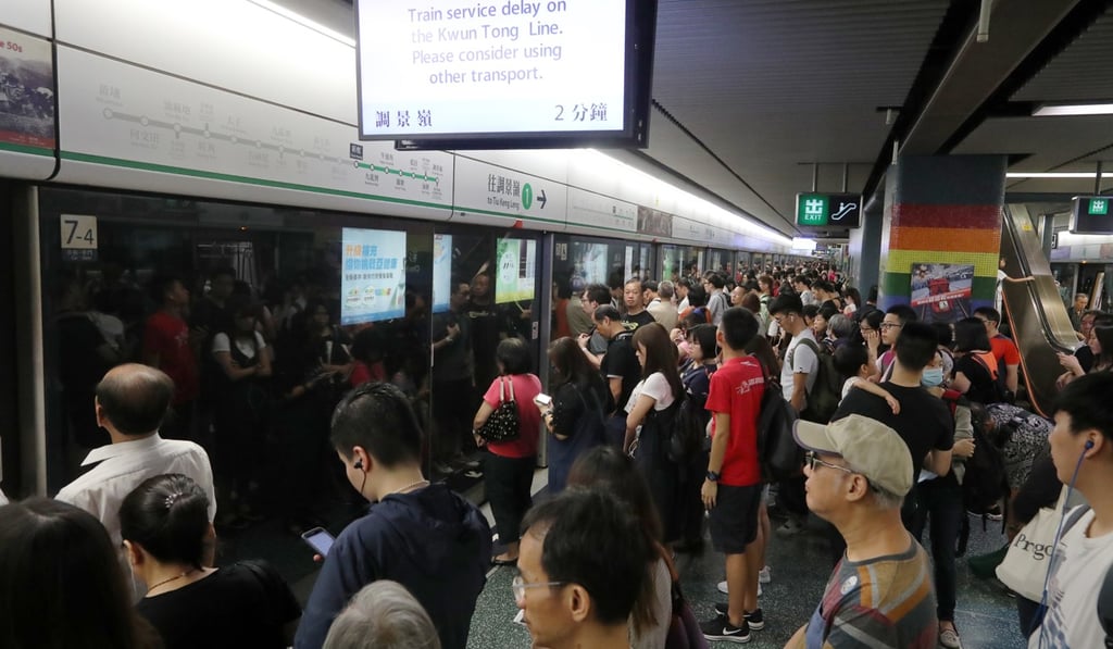 Passengers wait for an MTR train at Choi Hung station in August amid delays caused by a signalling fault. Photo: Edward Wong