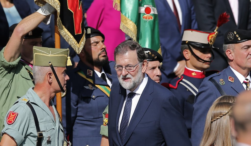 Spain's Prime Minister Mariano Rajoy, centre. He has threatened to impose direct rule over Catalonia if it does not drop its independence bid. Photo: AP