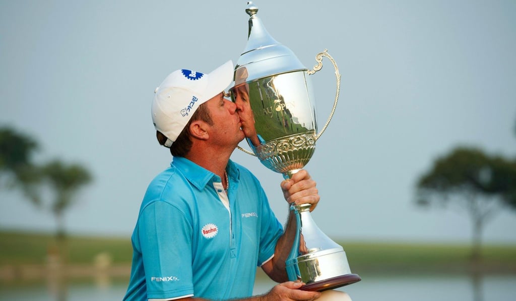 Scott Hend after winning in Macau in 2013. Photo: AFP