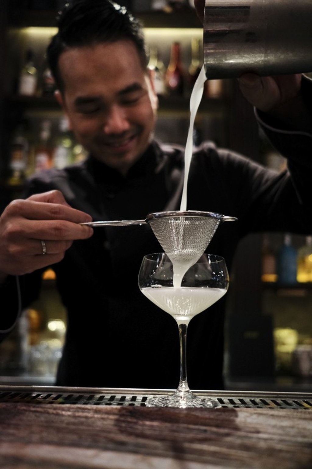 Antonio Lai mixes a pisco sour at Quinary.