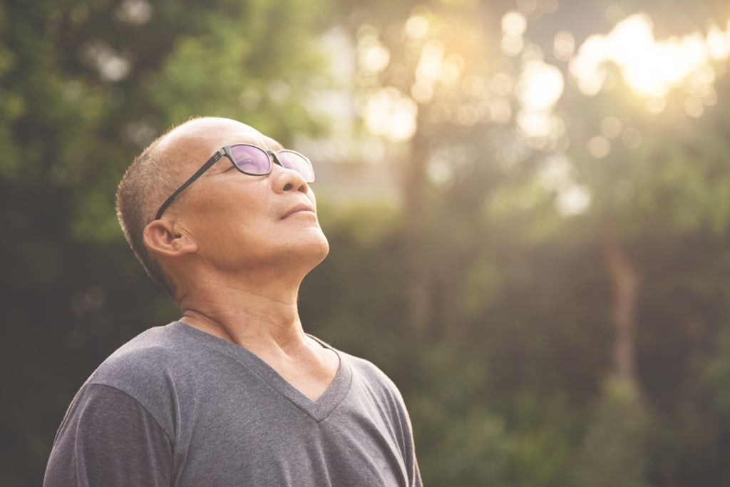 Even taking a moment to stand tall and breathe every day can help. Photo: Shutterstock