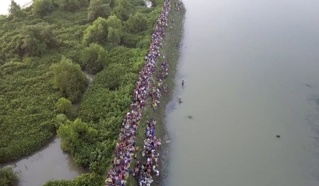 In this image from a video released by UNHCR, the UN refugee agency, thousands of Rohingya refugees arrive in Anjuman Para, Bangladesh, from Myanmar. Over 500,000 Rohingya Muslim refugees have fled violence in Myanmar and arrived in Bangladesh over the past seven weeks. Photo: UNHCR via AP