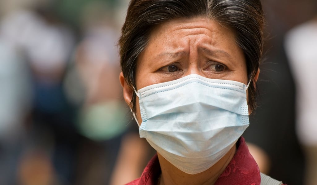 Many Hongkongers wear masks to protect themselves and others from the flu. Photo: Alamy