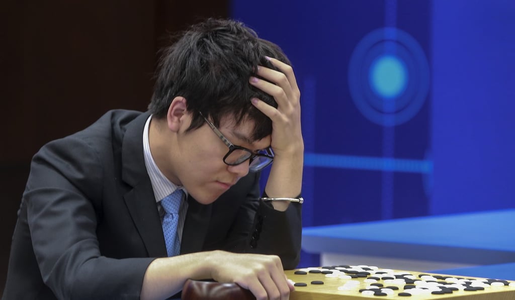 Chinese Go player Ke Jie plays a match against Google's artificial intelligence programme, AlphaGo, during the Future of Go Summit in Wuzhen in May. Photo: AP