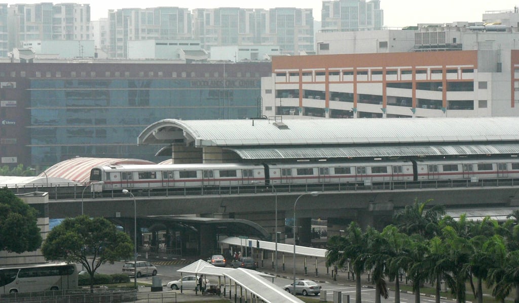 An MRT train leaves a station in Singapore. Photo: AFP