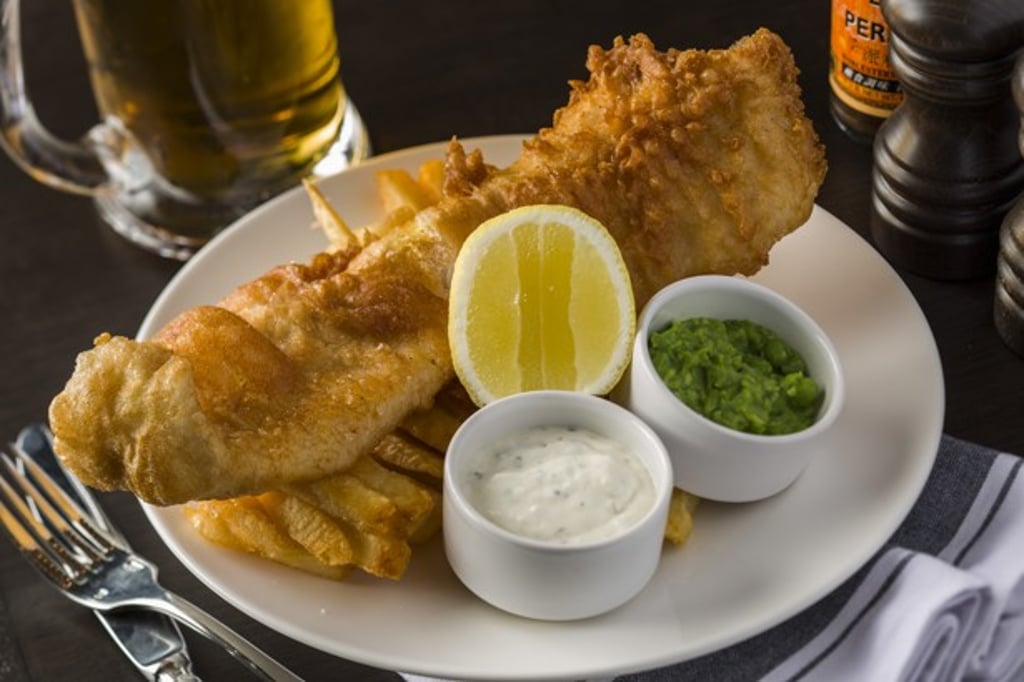 London House by Gordon Ramsay, in Tsim Sha Tsui, Hong Kong, serves fish and chips with mushy peas and tartare sauce.