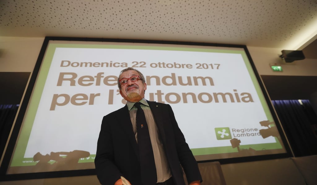 Lombardy Region President Roberto Maroni arrives for a press conference in Milan on Sunday. Photo: AP Lombardy Region President Roberto Maroni arrives for a press conference in Milan on Sunday. Photo: AP