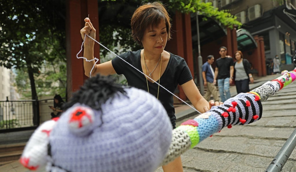 Esther Poon Suk-han in action on Pottinger Street. Photo: Sam Tsang