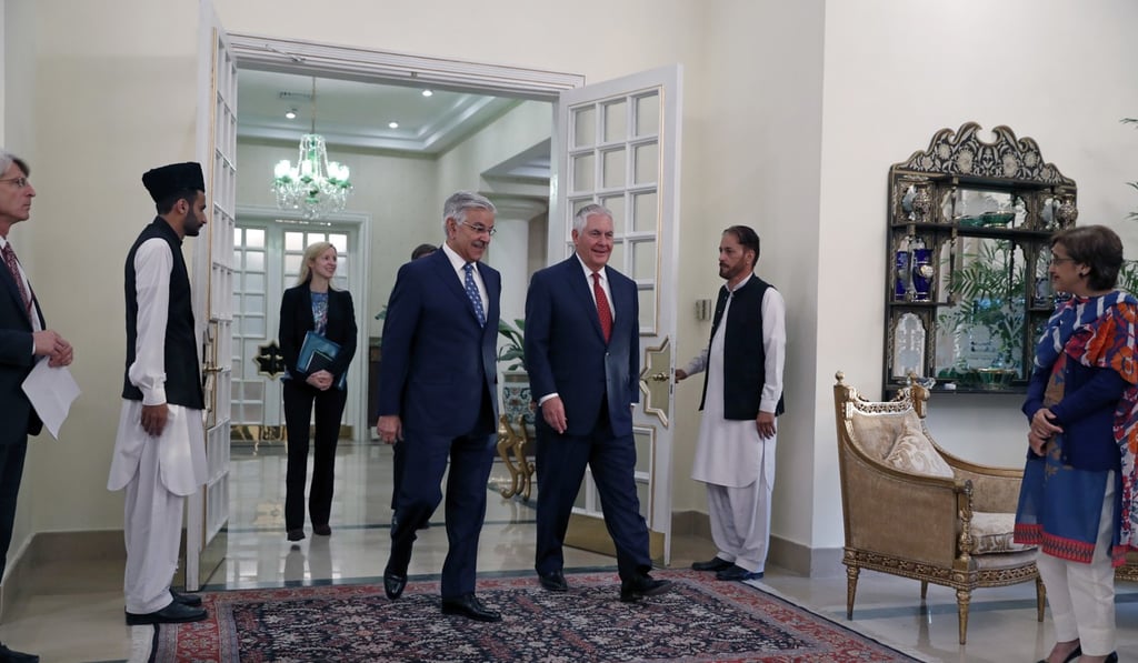 US Secretary of State Rex Tillerson walks with Pakistani Foreign Minister Khawaja Asif, as he arrives at the Pakistani prime minister's residence. Photo: AP US Secretary of State Rex Tillerson walks with Pakistani Foreign Minister Khawaja Asif, as he arrives at the Pakistani prime minister's residence. Photo: AP