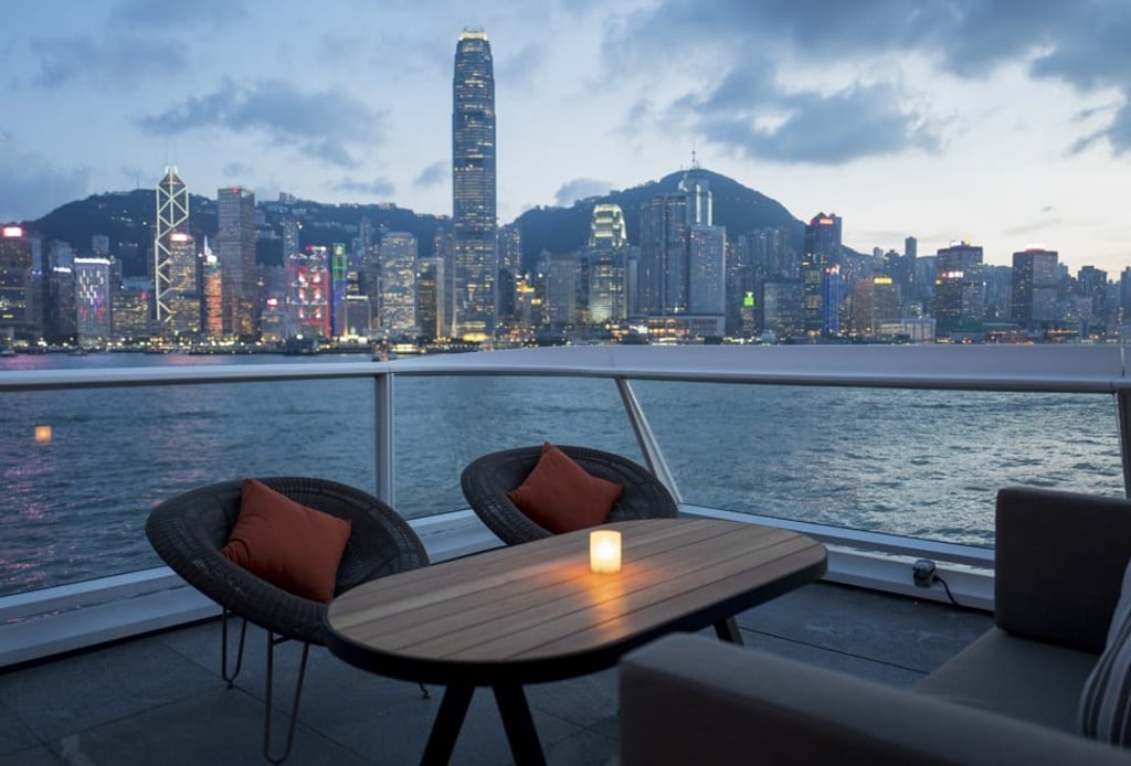 A narrow balcony for drinks gives an unobstructed view of the harbour.