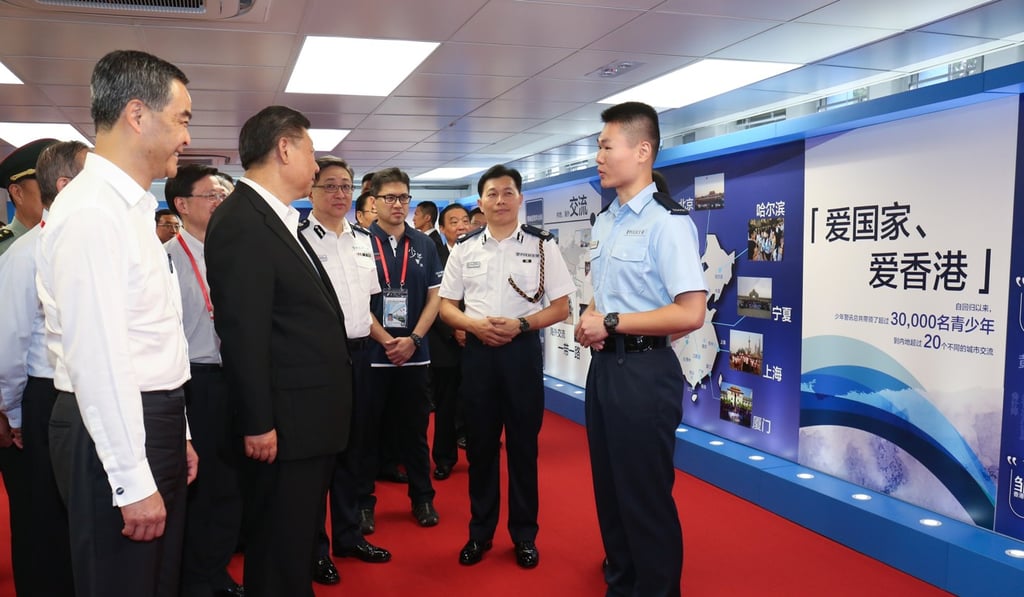 President Xi visiting a police youth group exhibition in Pat Heung on June 30. Photo: Information Services Department