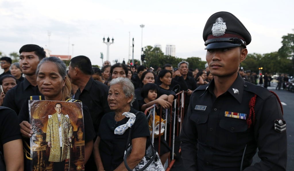 Security is tight as Thai mourners queue up to attend the Royal Cremation ceremony of the late Thai King Bhumibol Adulyadej outside the Royal Crematorium in Bangkok. Photo: EPA Security is tight as Thai mourners queue up to attend the Royal Cremation ceremony of the late Thai King Bhumibol Adulyadej outside the Royal Crematorium in Bangkok. Photo: EPA