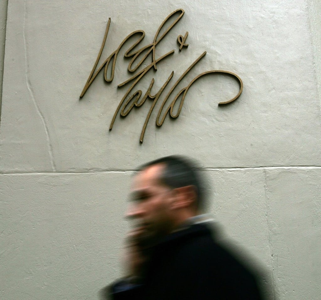 A man hurries past the Lord&Taylor department store in New York City. Photo: Agence France-Presse