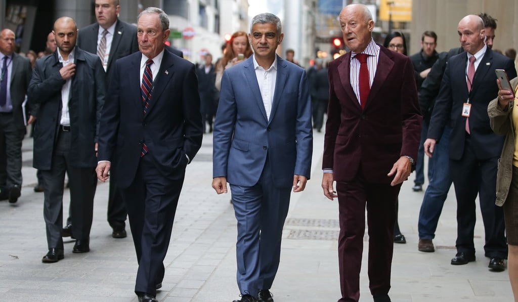 Michael Bloomberg, London Mayor Sadiq Khan and architect Norman Foster are seen walking together at the launch of Bloomberg’s new European Headquarters in the City of London on Tuesday. Photo: Agence France-Presse