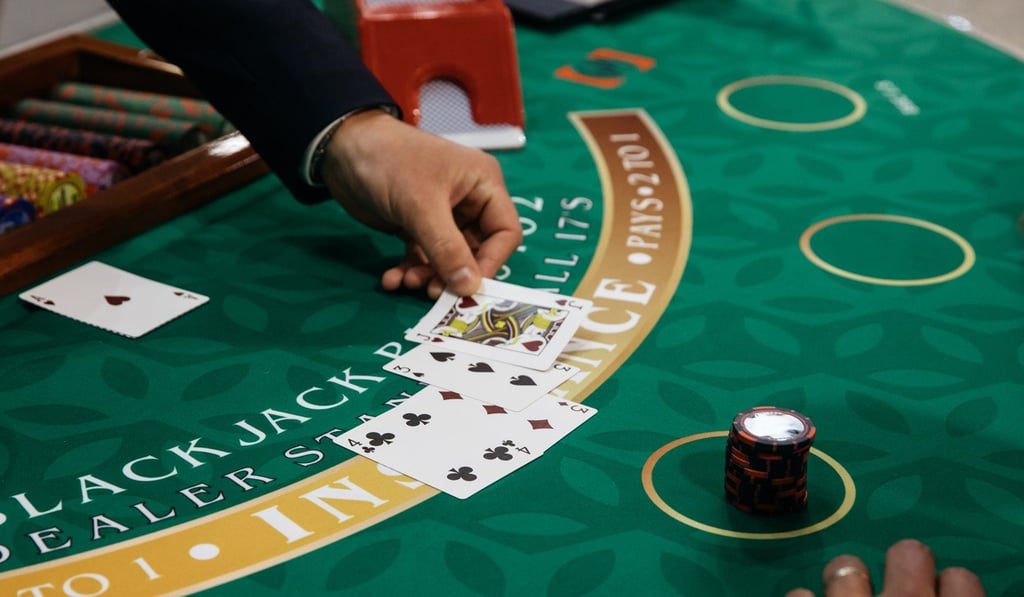 Cards are dealt on a Blackjack table at the Venetian Macao. Photo: Bloomberg